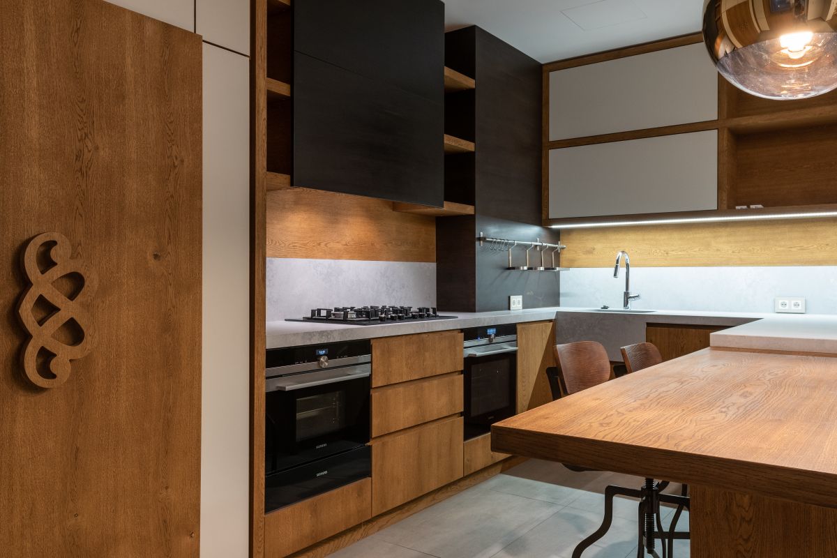 Modern kitchen with warm wood cabinetry and clean lines